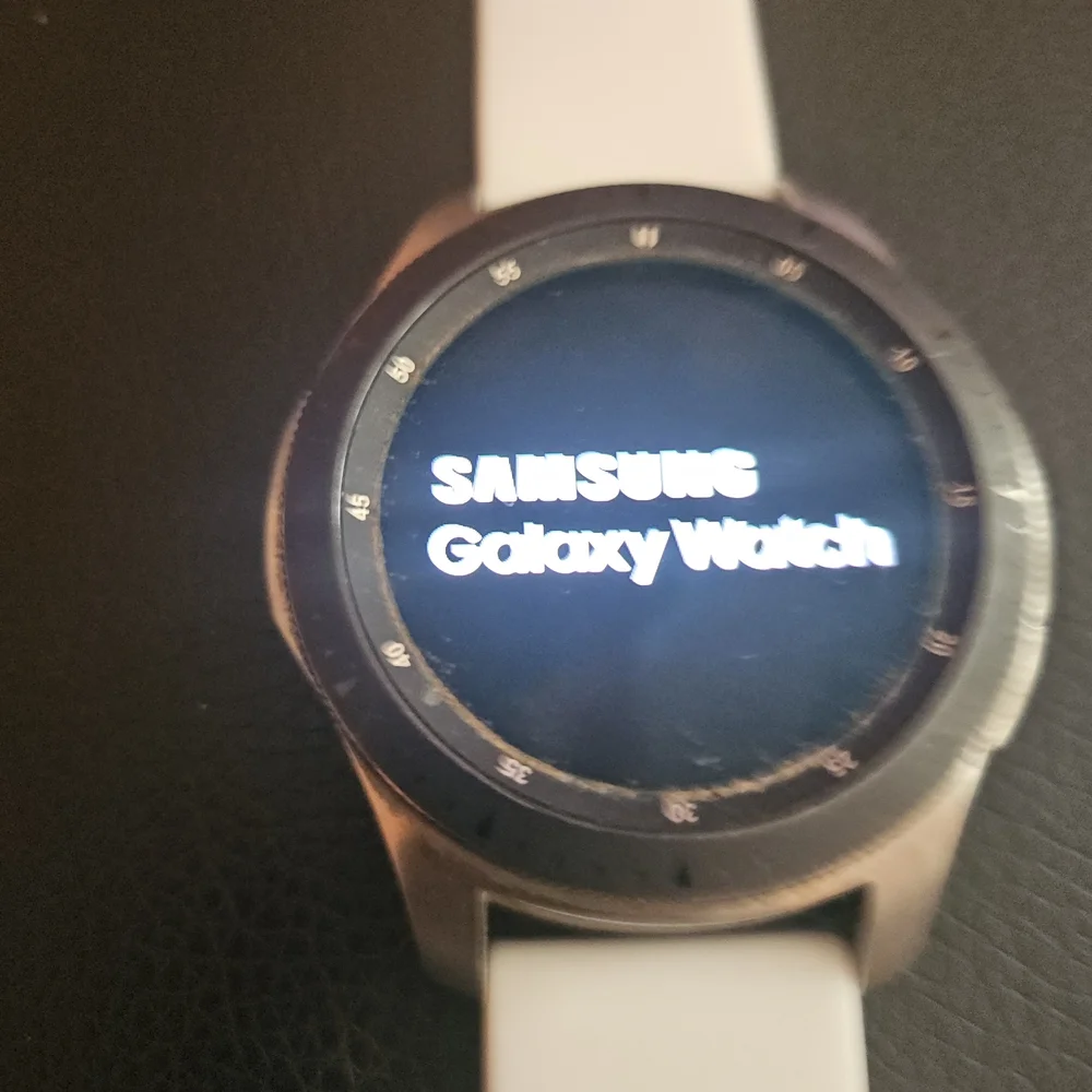 Samsung Smartwatch(DF96) with Silver Bezel and White Band
